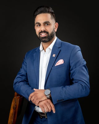 Portrait of Aman Sandhu, Associate.